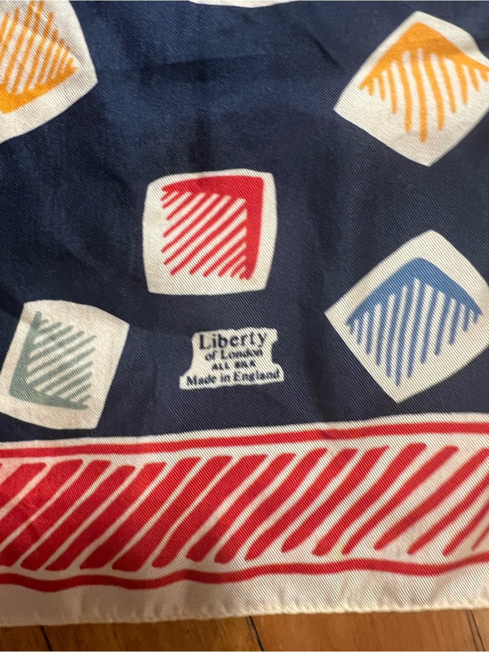 Liberty Made in England Navy Scarf with Red, Blue, Yellow, Green Accents
